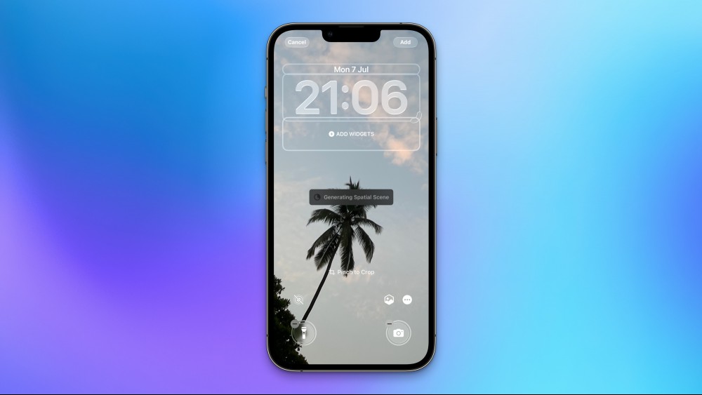 The iOS 26 lock screen, with a message that reads: Generating Spatial Scene.