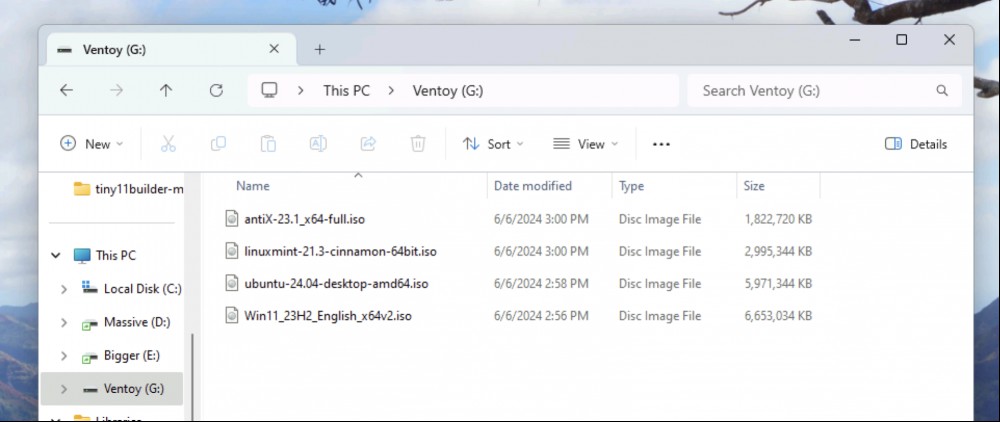 A Ventoy partition shown in Windows' File Explorer. There are four ISO files in it. 