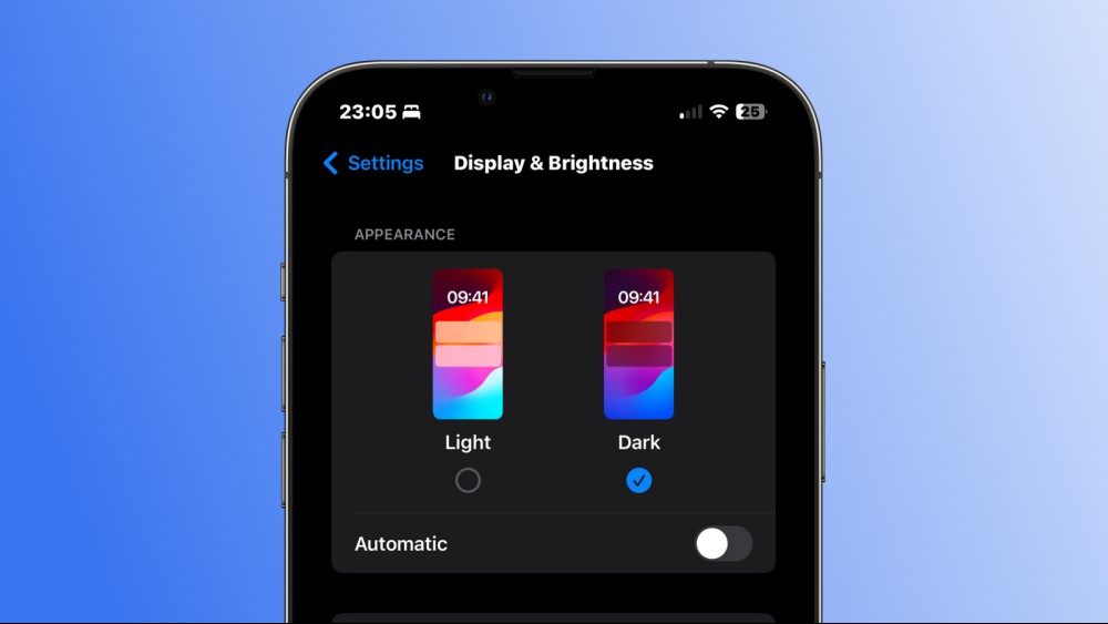 A screenshot of an iPhone against a blue gradient background, showing the Dark Mode selected on the Display & Brightness Settings page.