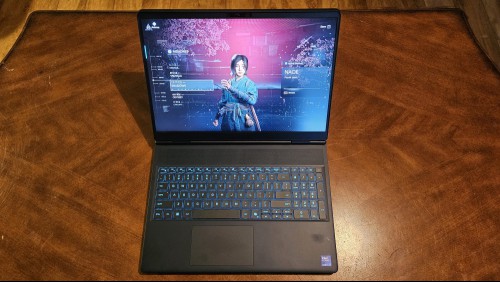The Alienware Aurora 16X open on a tabletop, running Assassin's Creed: Shadows.