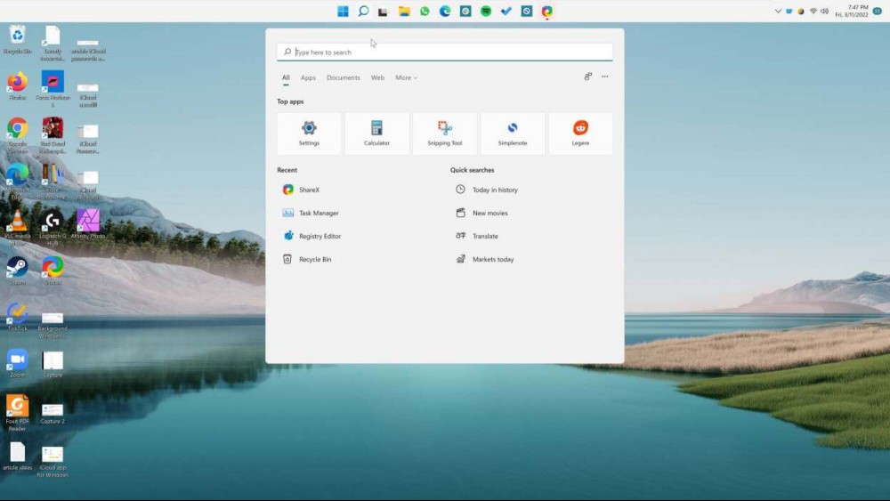 Taskbar on top of the screen in Windows 11.