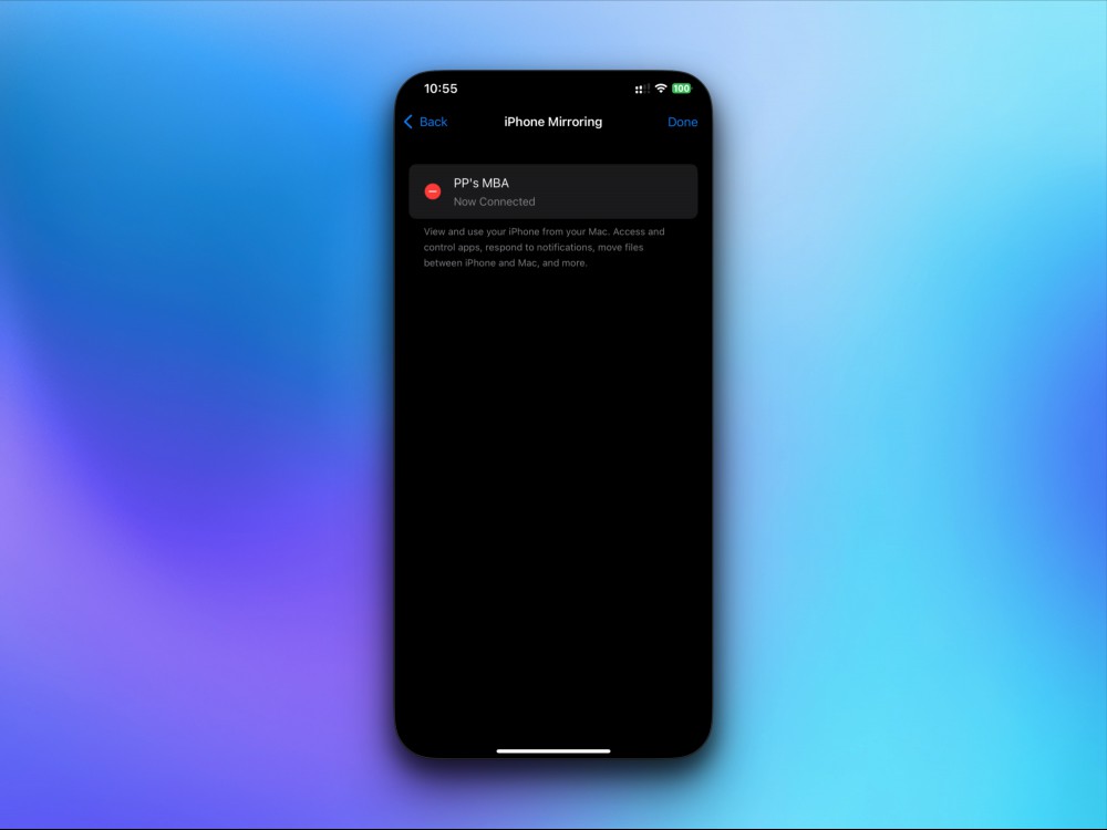An iPhone settings page showing the option to remove a Mac from iPhone mirroring.