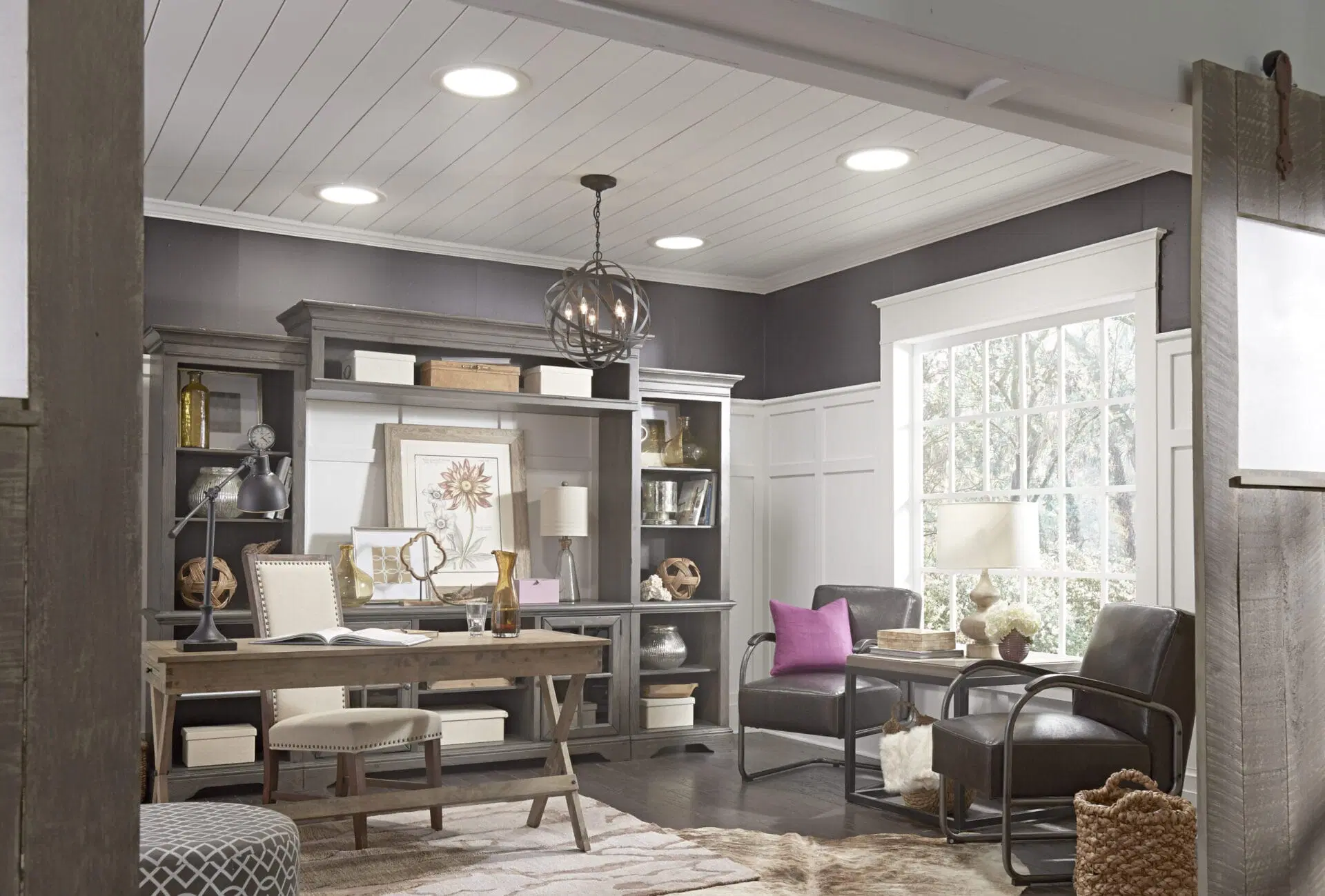 Home office lit with natural light coming from four sun tunnels.