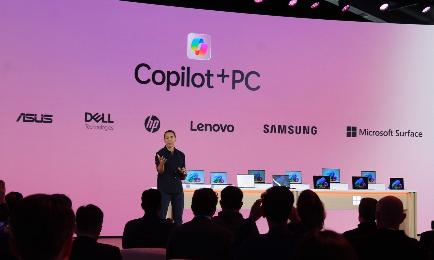 Microsoft showing off several Copilot+ PCs.