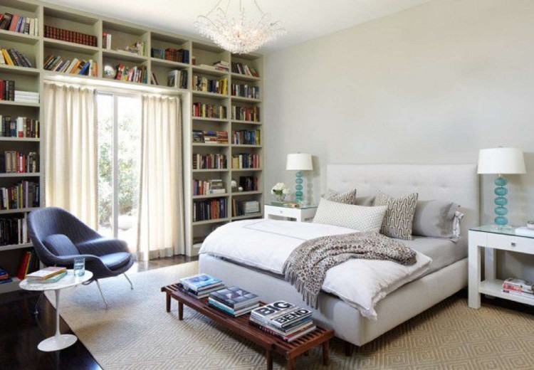 Built in bookcases in modern bedroom