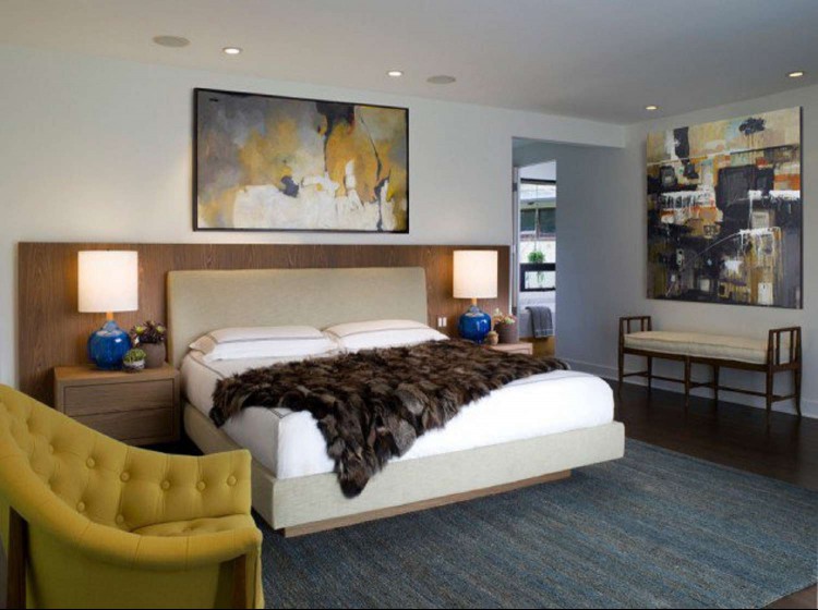 Abstract artwork in modern bedroom