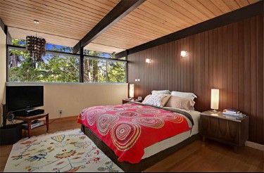 Modern bedroom with wood paneling