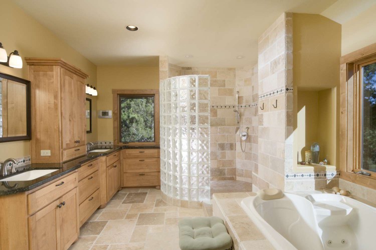 Modern bathroom with large, open shower, jet tub