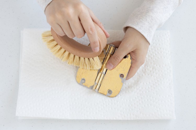 scraping off excess paint