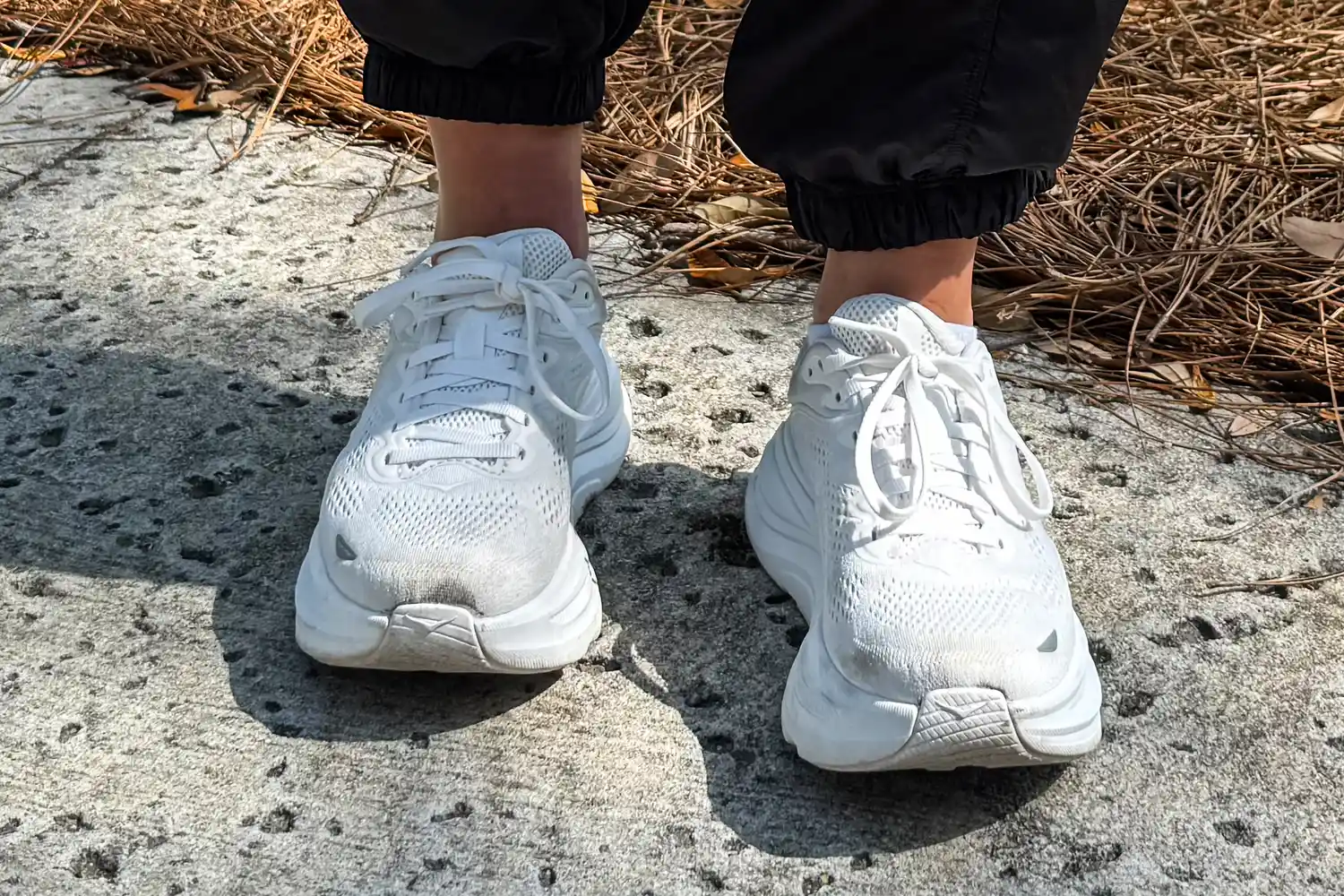 The front of a person wearing the HOKA Men's Bondi 9 Running Shoes