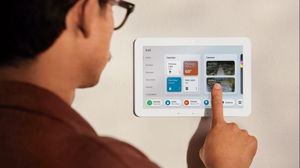 A person using the Amazon Echo Hub.