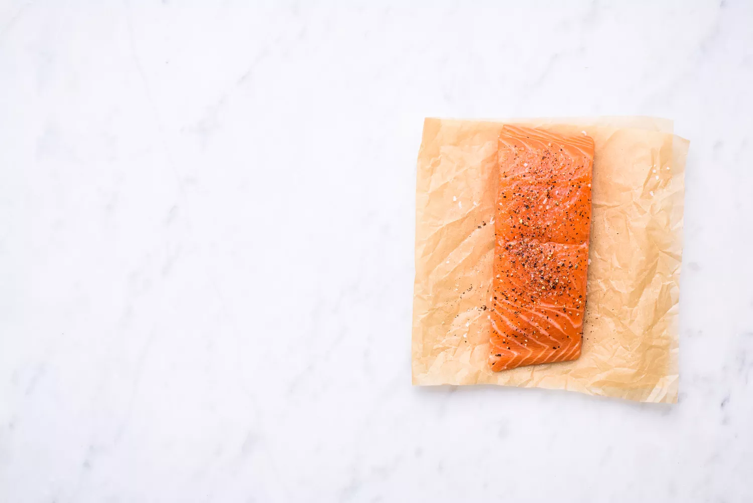 salmon on parchment paper