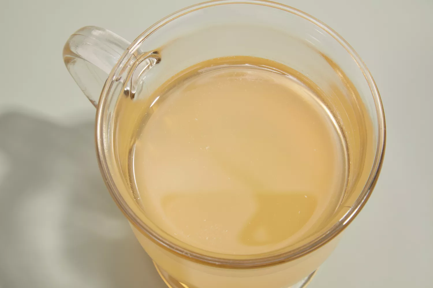 A glass of FOND Certified Organic Chicken Bone Broth