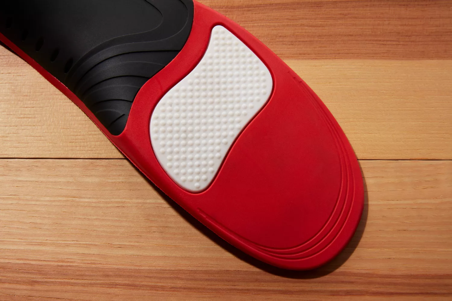 Closeup of the bottom of an EasyFeet Plantar Fasciitis Arch Support Insole