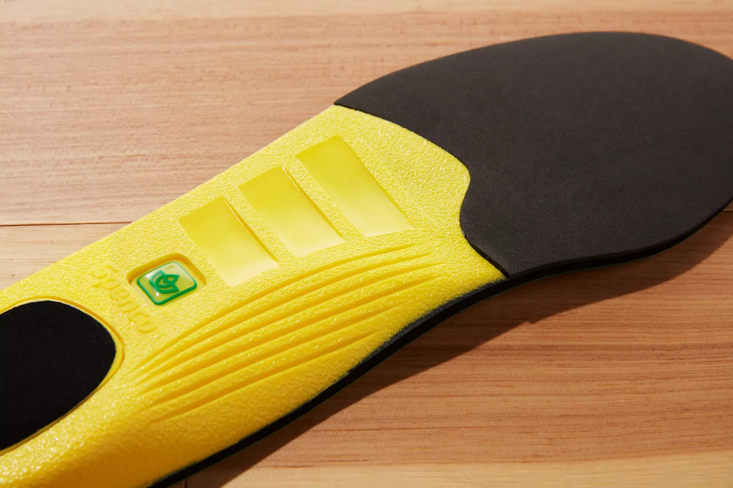 Closeup of the bottom of a Spenco PolySorb Cross Trainer Insoles