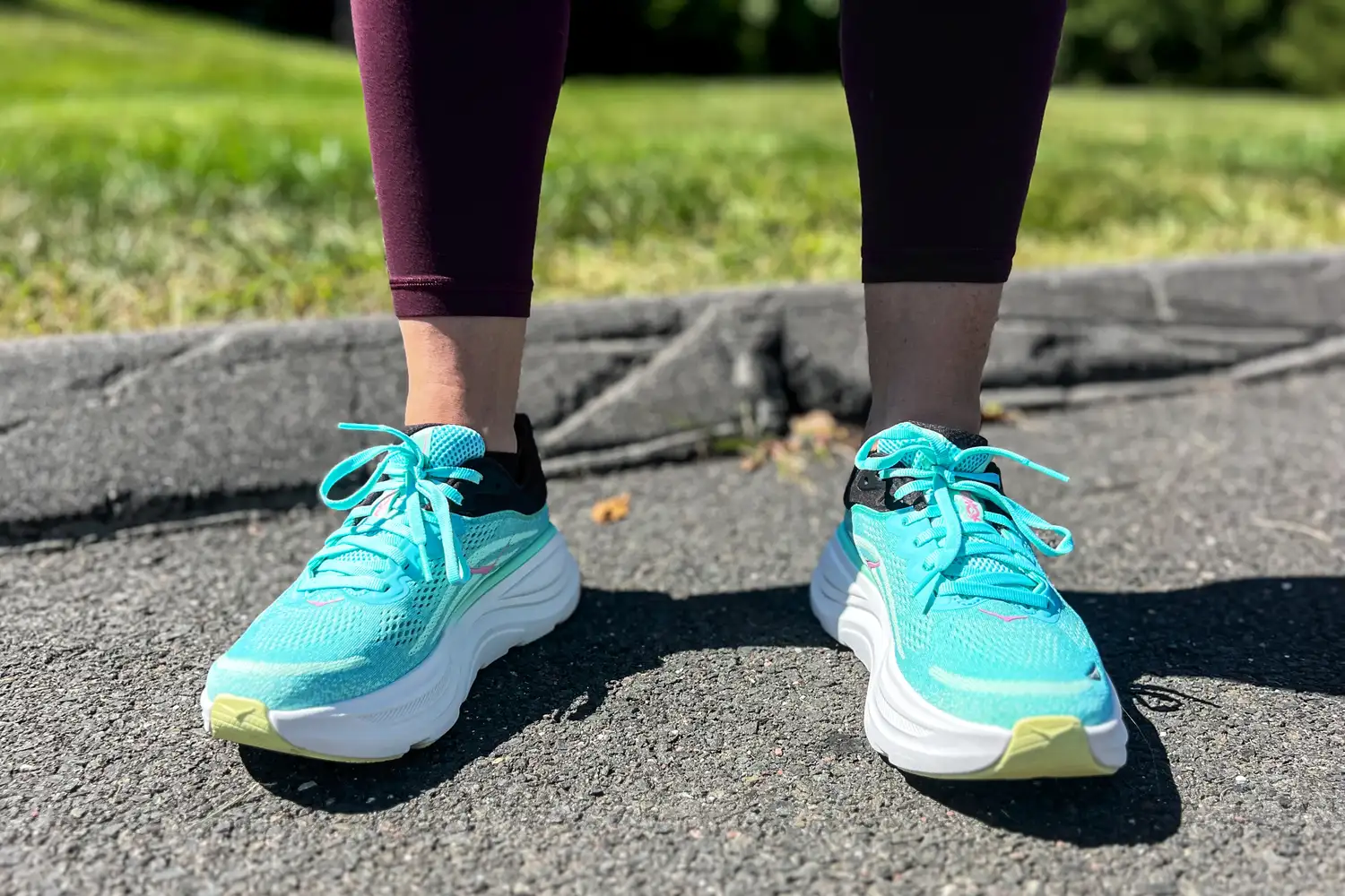 A front view of a person wearing the Hoka Women's Bondi 9 Running Shoes