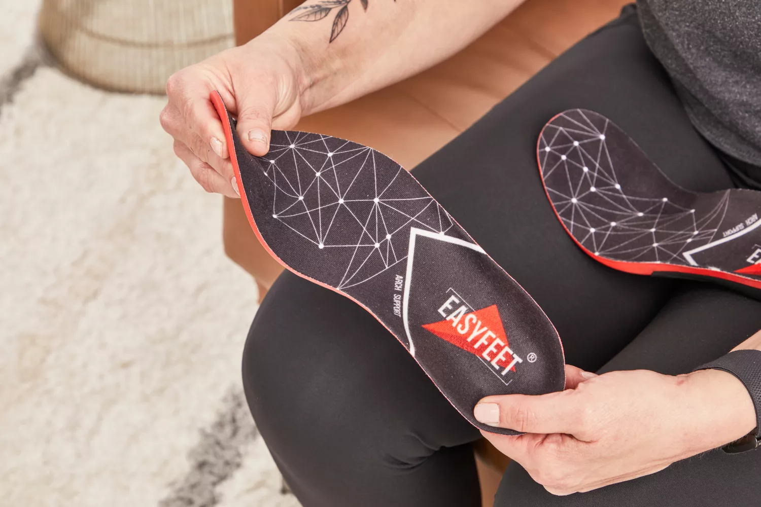 Person twisting an EasyFeet Plantar Fasciitis Arch Support Insoles