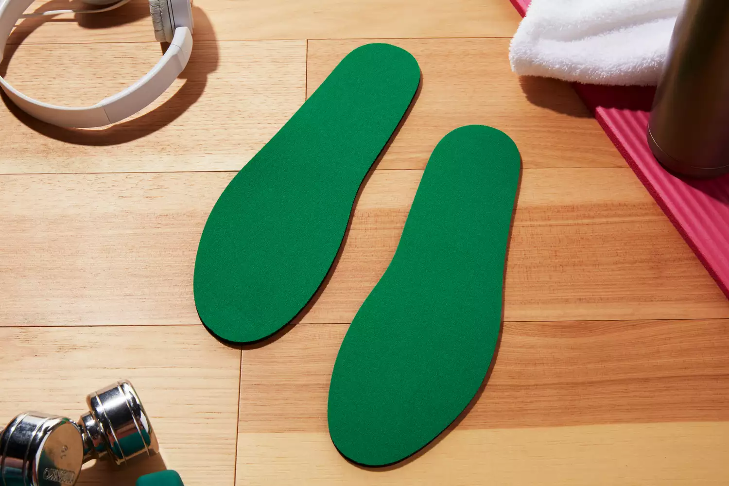Spenco RX Comfort Insoles displayed on a wood floor