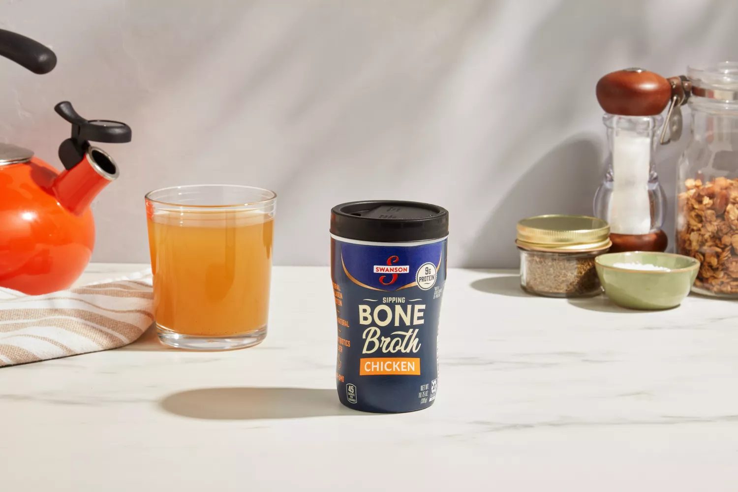 A container of Swanson Sipping Chicken Bone Broth