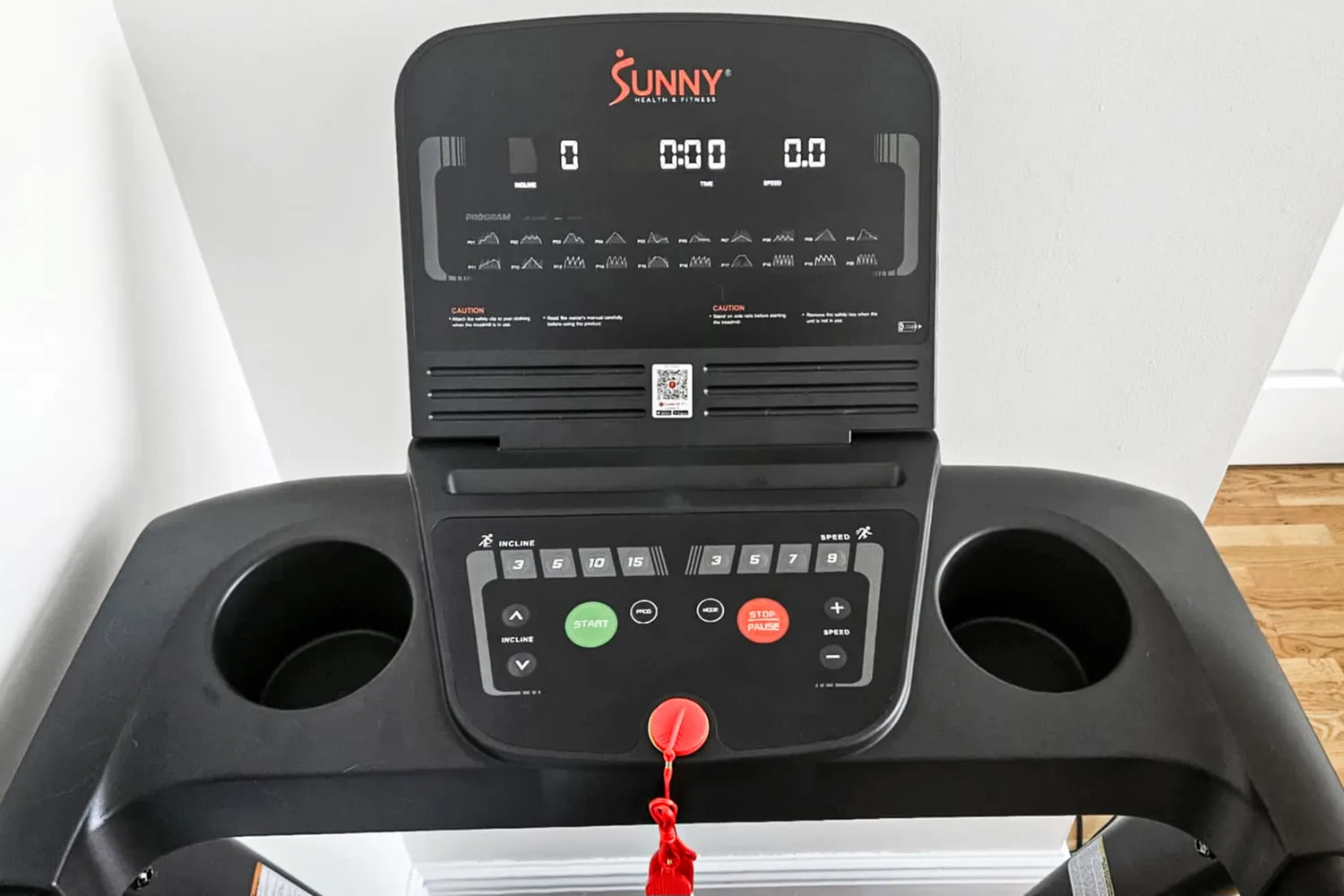 The controls and digital display on the Sunny Health & Fitness Active 400 Smart Auto Incline Wi-Fi Treadmill