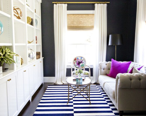 Simple living room with black walls