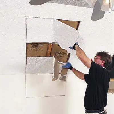cutting the drywall for a new skylight
