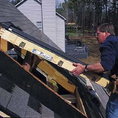 installation of a skylight frame into a roof