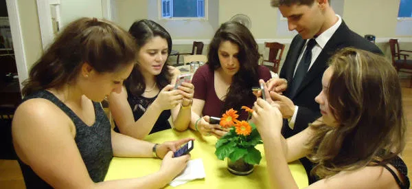 socialisolation-lookingatphone socialisolation-lookingatphone