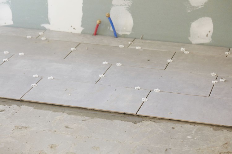 Kitchen flooring installed with ceramic tiles 