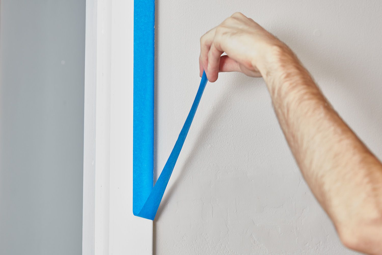 Removing painters tape from wall