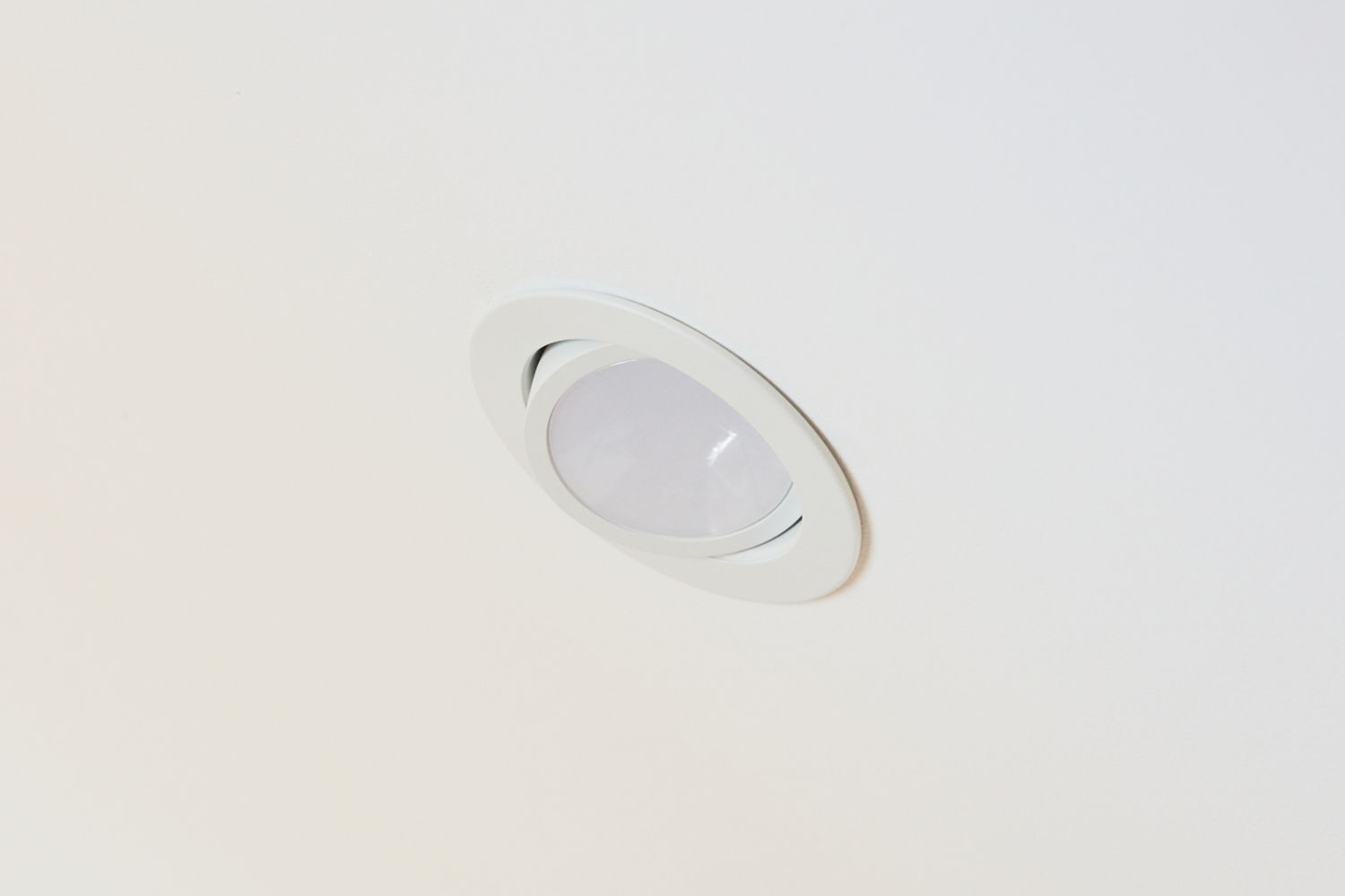 Gimbal recessed lighting on ceiling closeup