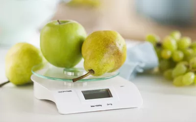 Fresh fruits on weight scale