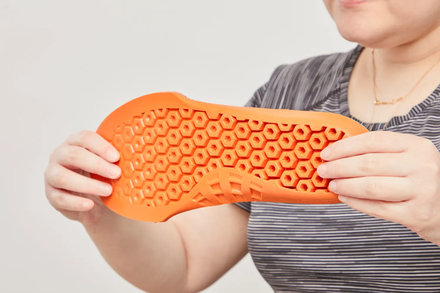 Person holding a Timberland Pro Anti-Fatigue Technology Insole