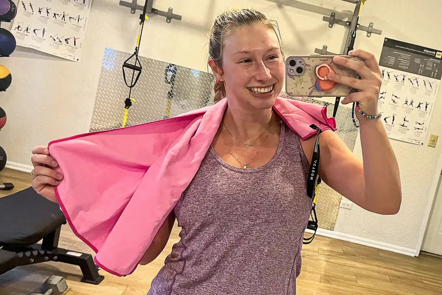 A person uses the Acteon Microfiber Quick Dry Gym Towel while working out