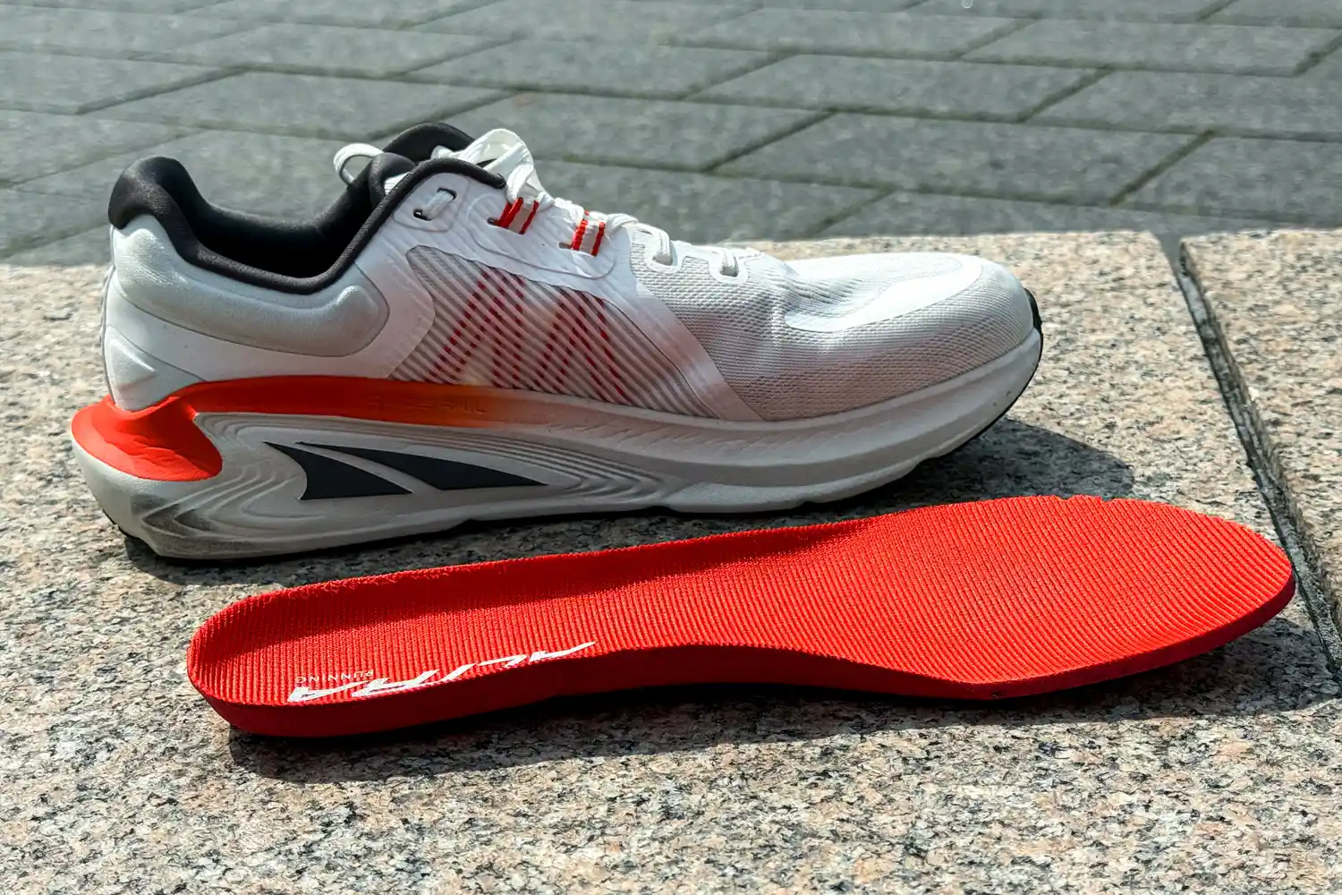 The insole next to the Altra Men's Paradigm 7 Sneaker