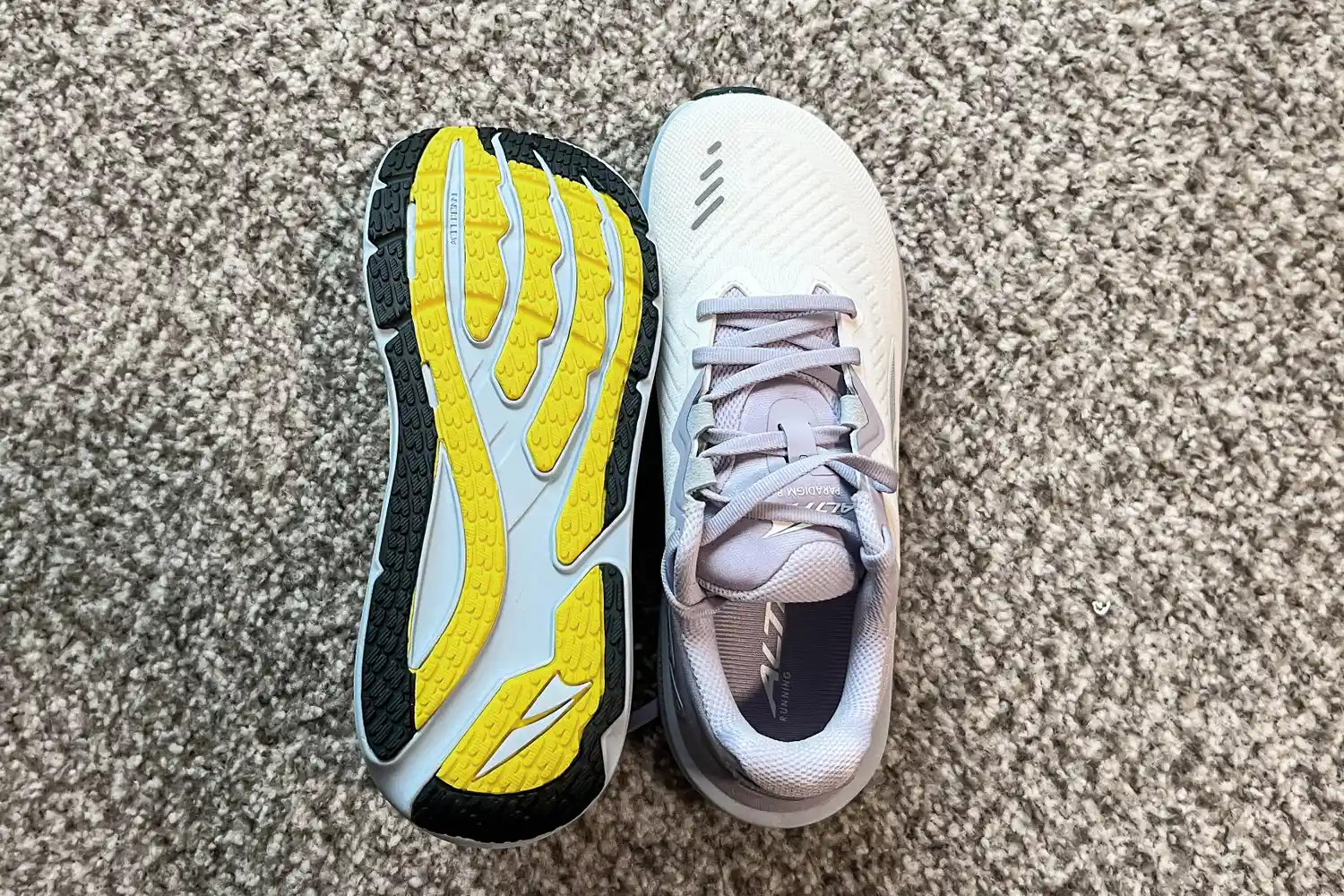 The laces and the treads on the Altra Women's Paradigm 8 Running Shoes