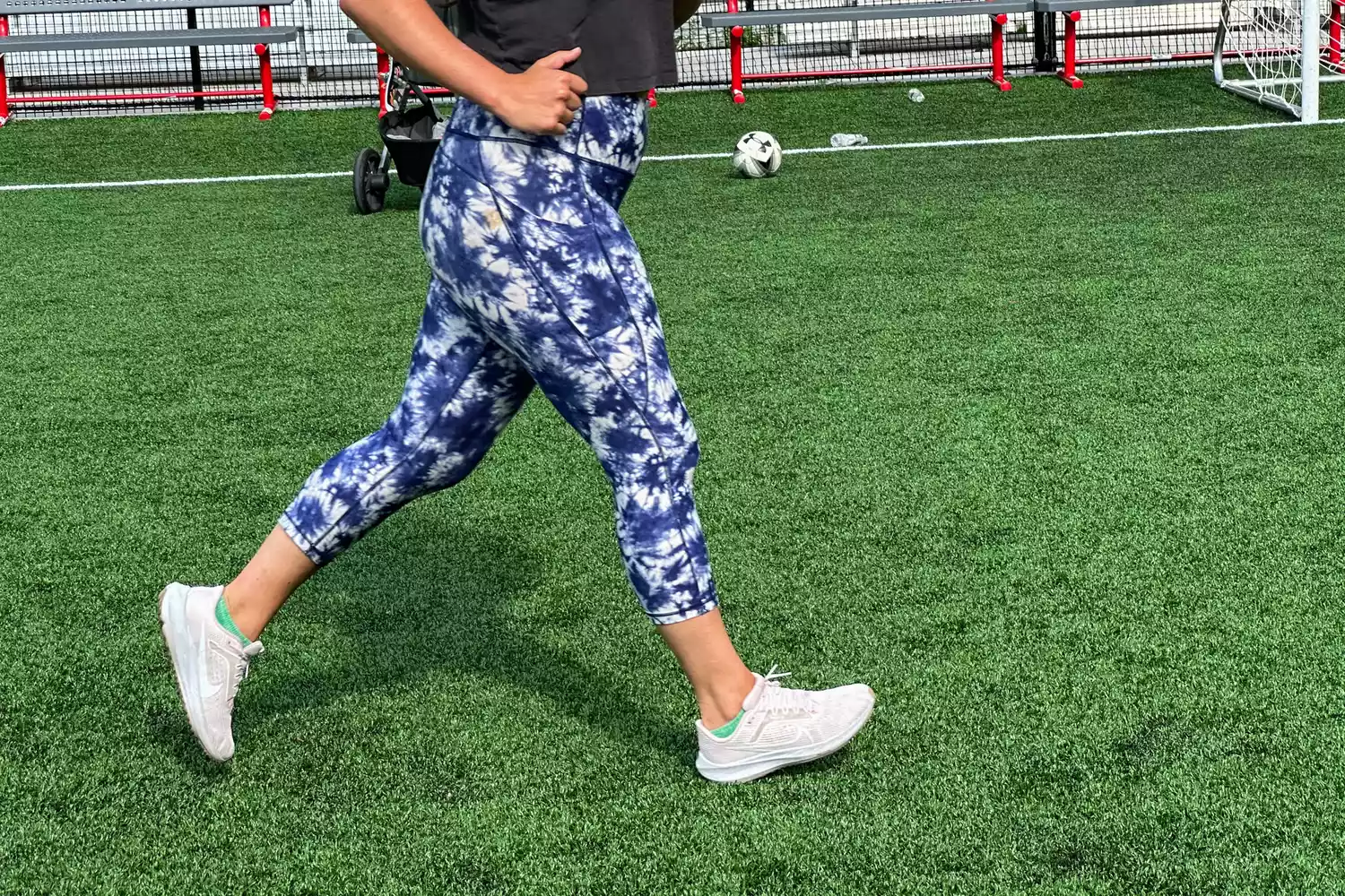 A person running while wearing Nike Womenâs Pegasus 40