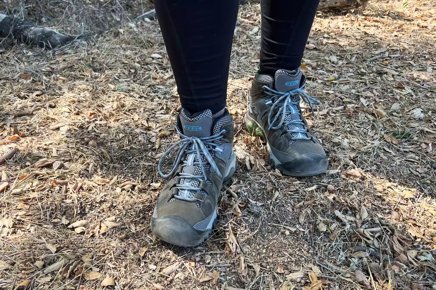 Person wearing KEEN Targhee III Mid Waterproof Hiking Boots standing on a trail