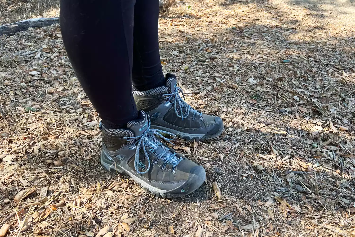 Person wearing KEEN Targhee III Mid Waterproof Hiking Boots standing on a trail