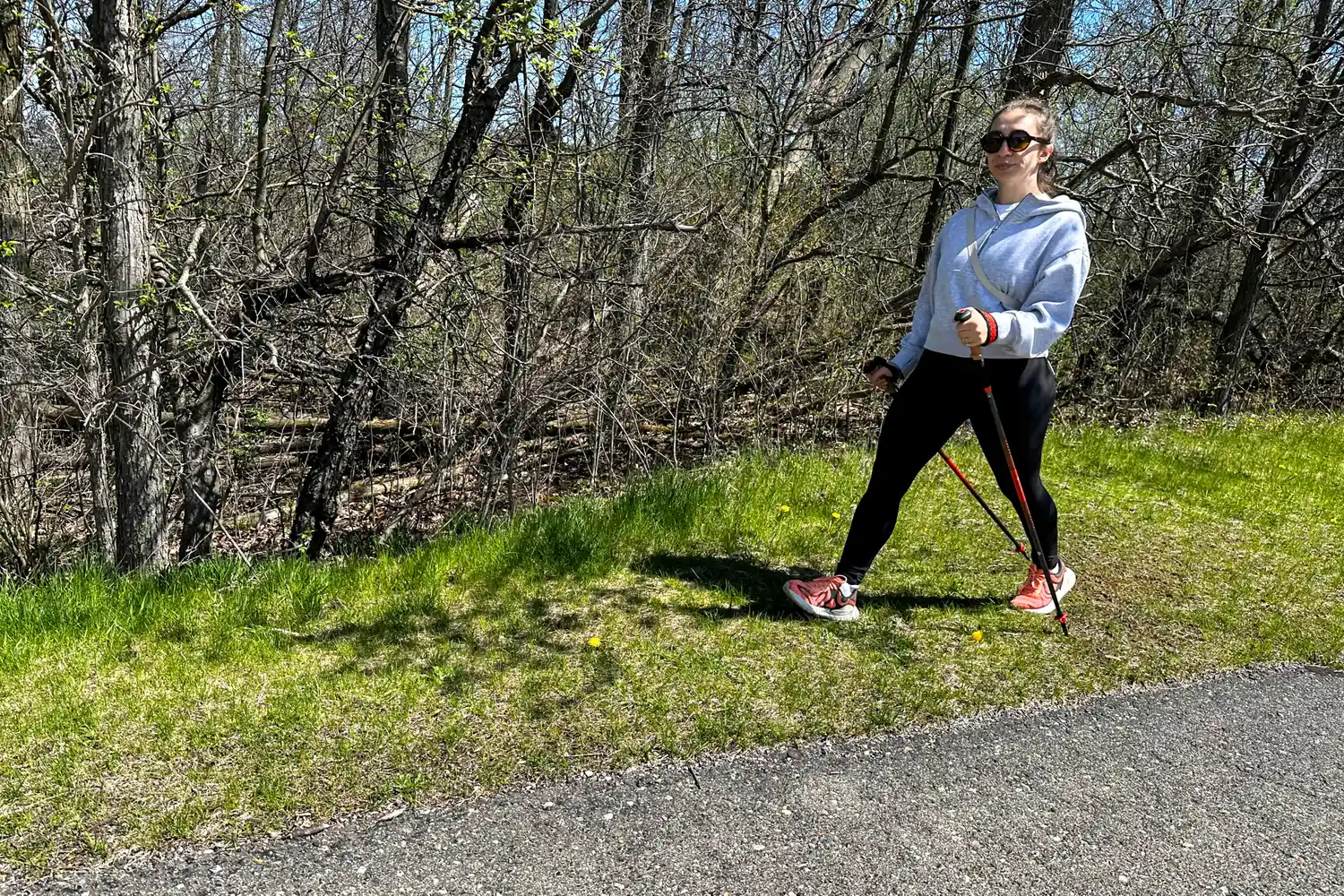 A person uses the Black Diamond Pursuit Carbon Z Poles outside
