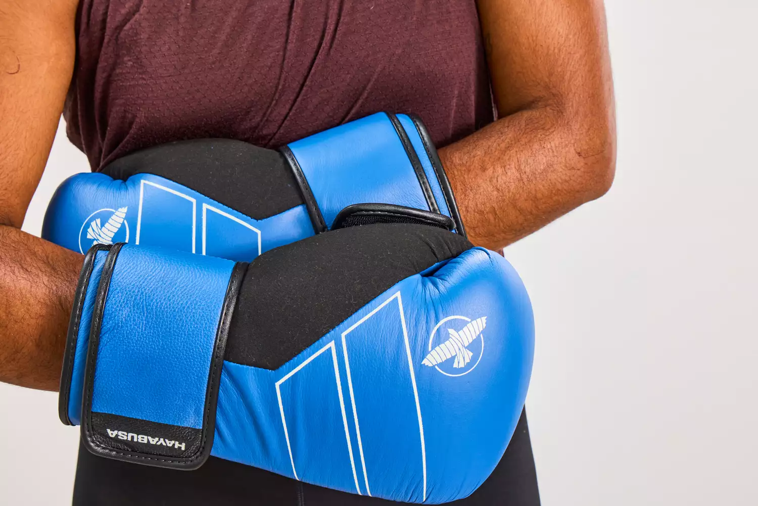 A person wears the Hayabusa S4 Leather Boxing Gloves