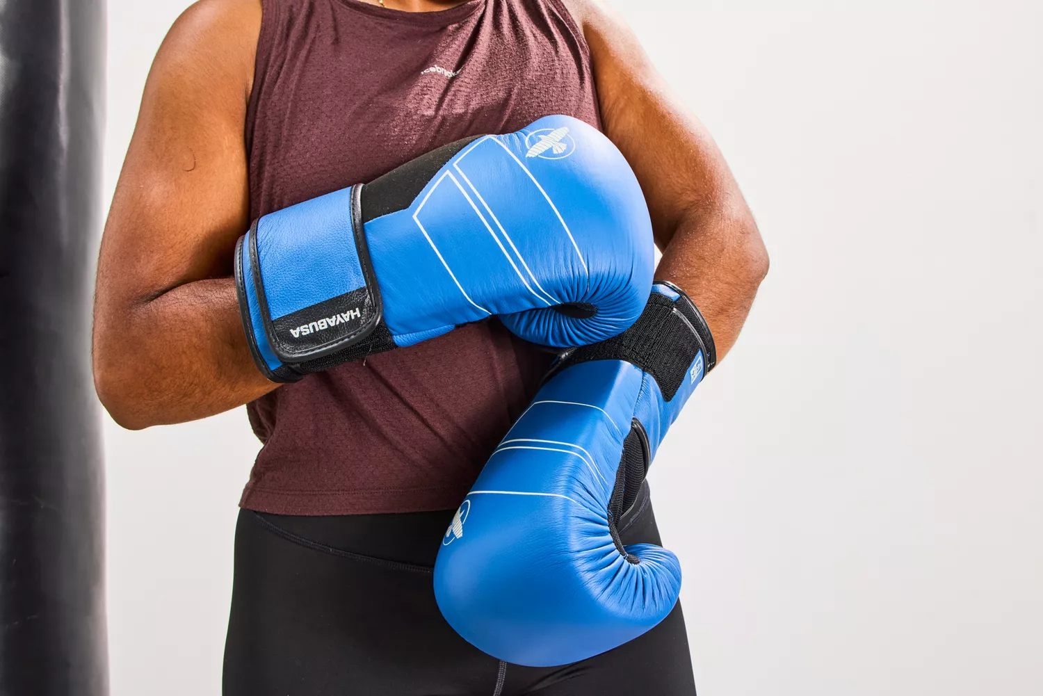 A person wears the Hayabusa S4 Leather Boxing Gloves