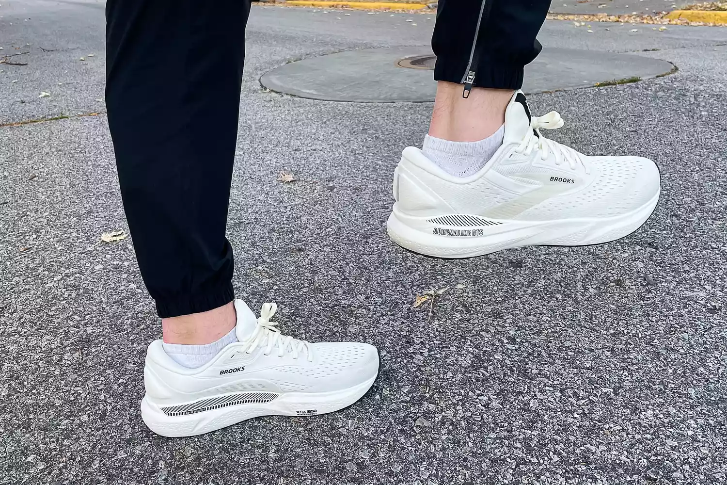 A person exercises while wearing the Brooks Men's Adrenaline GTS 24 Running Shoes