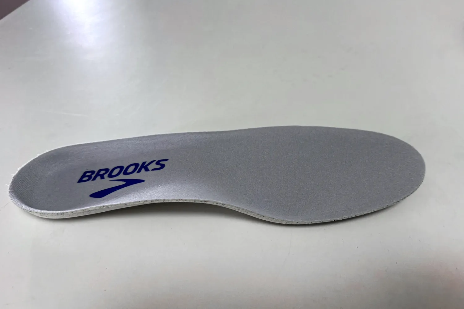 The insole for the Brooks Women's Glycerin GTS 22 Running Shoes on a table
