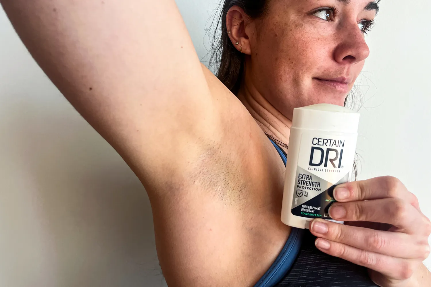 A person holds up the Certain Dri Extra Strength Antiperspirant Deodorant