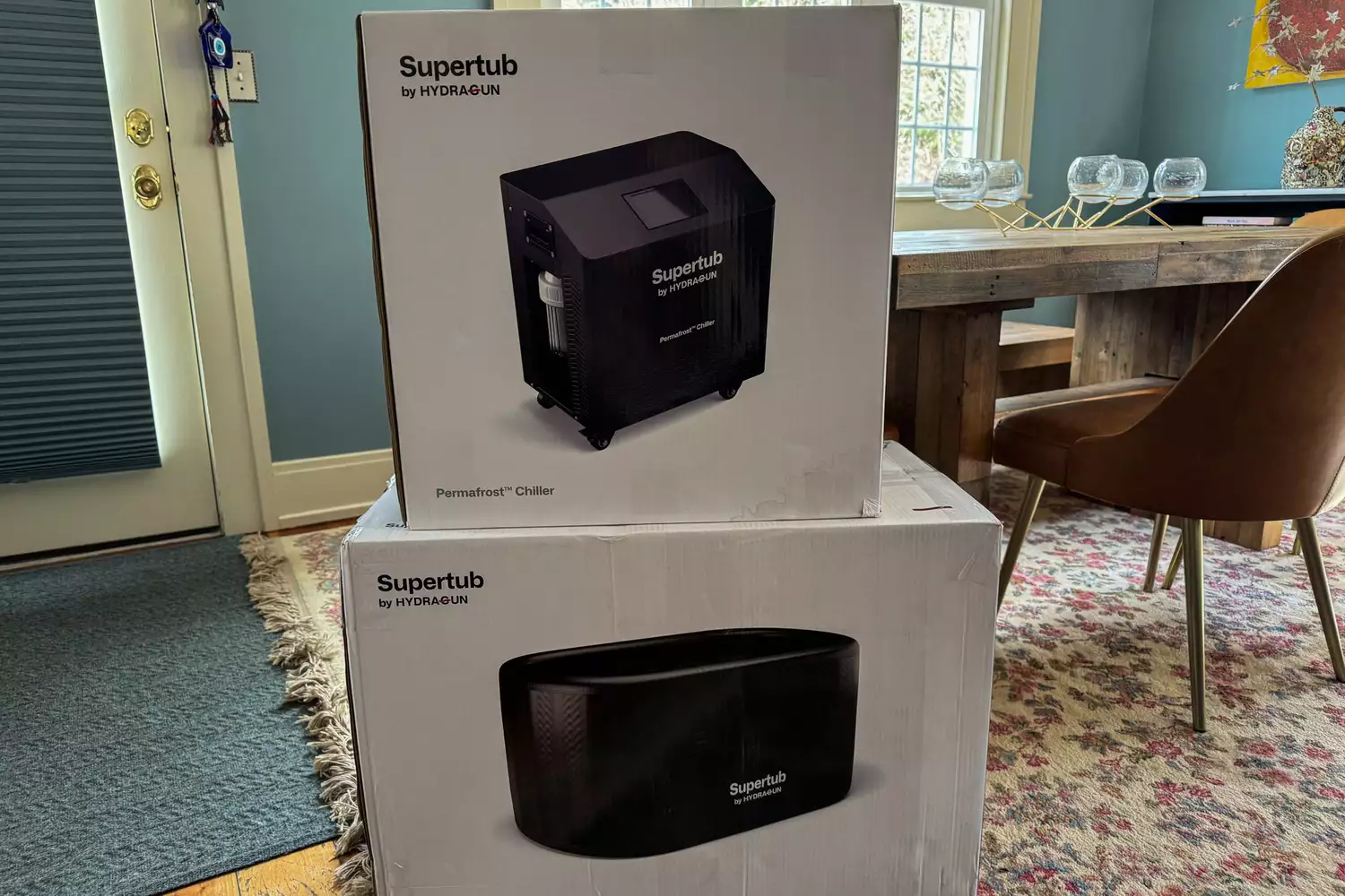 Hydragun Supertub Cold Plunge box sitting in a dining room