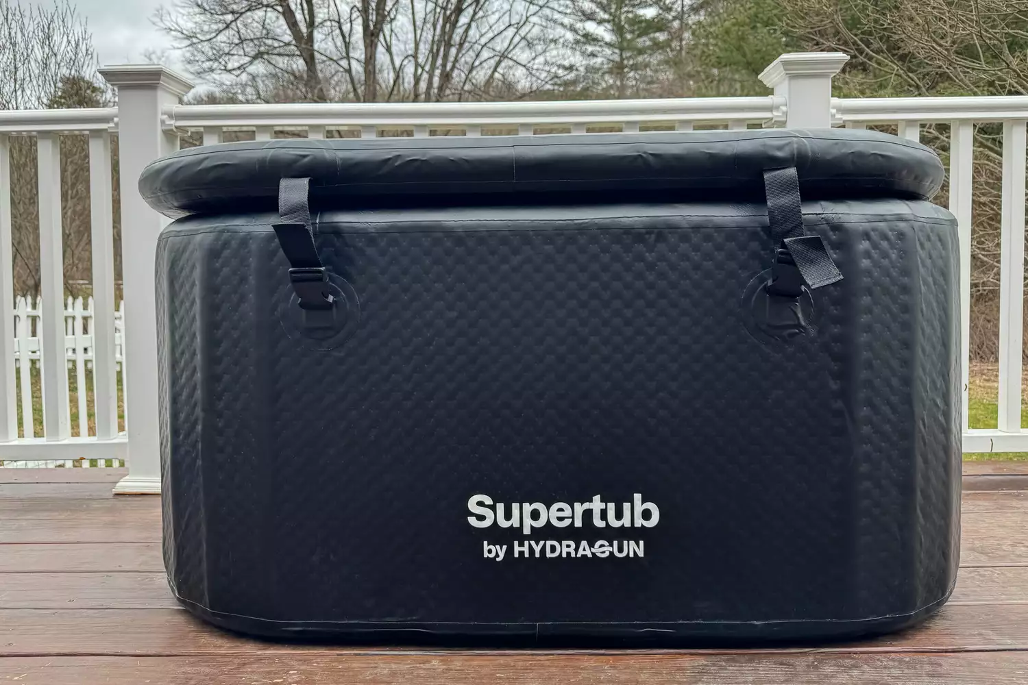 The Hydragun Supertub Cold Plunge sitting on a wood deck
