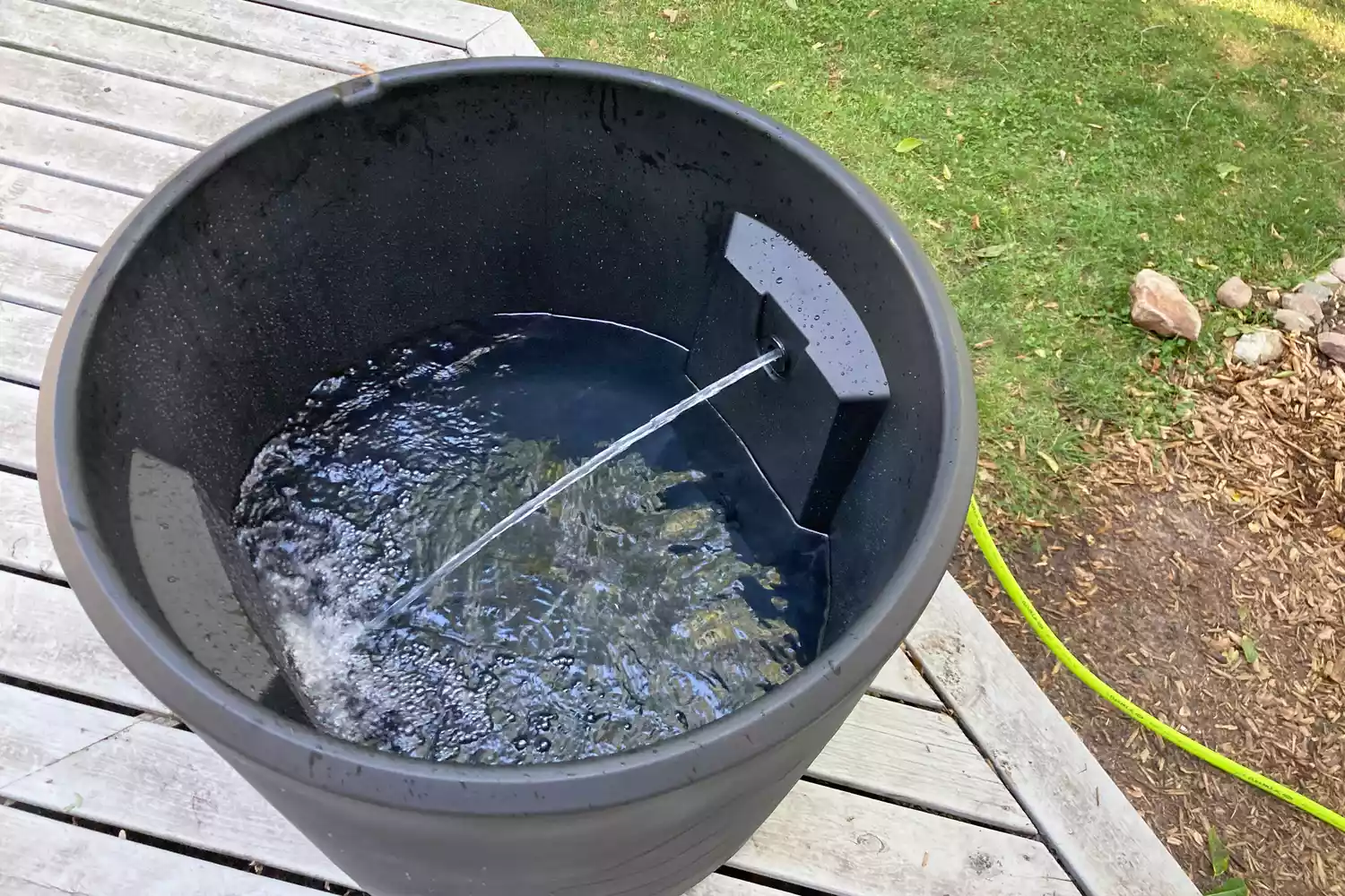 A hose attached to the Ice Barrel 300 and filling it up