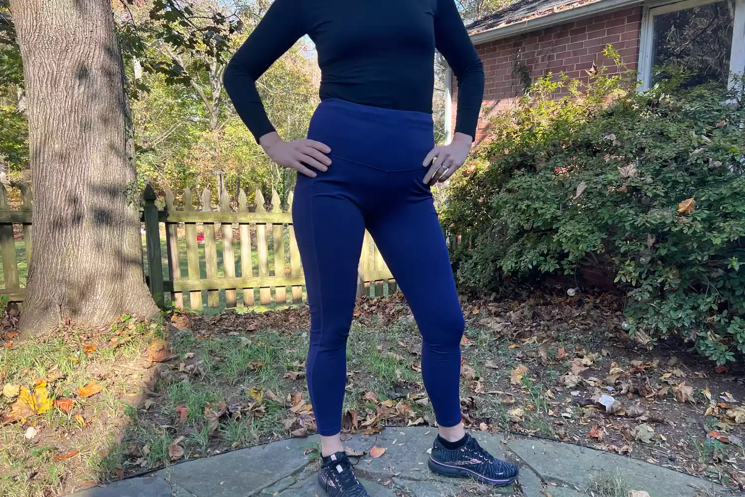 Person standing outside showing the front of Baleaf Women's Laureate Thermal Water-Resistant Leggings