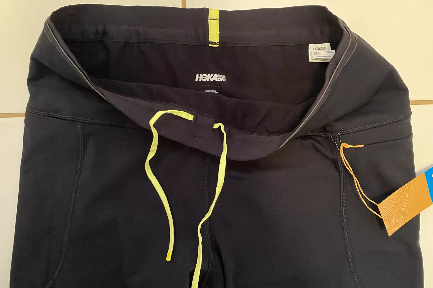 Close up of the waistband on a Hoka Women's 28 Inch ColdSnap Run Tight